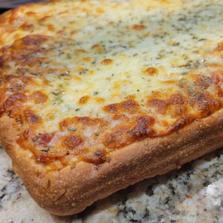 Savor our cheese pizza